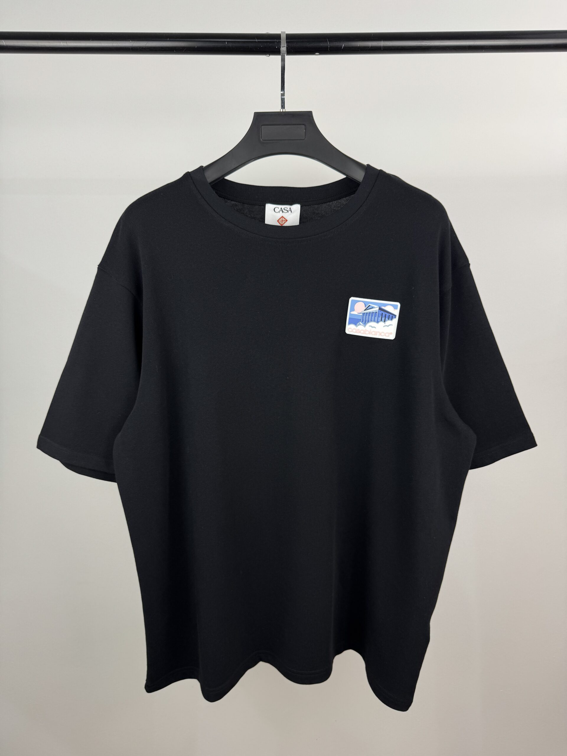 CASA BLANCA PLACA NEGRA